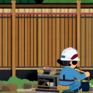 フェンスを建てている職人さん-small